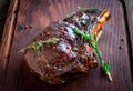 Grilled Ribeye Steak on bones on wooden board Royalty Free Stock Photo