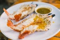 Grilled river prawns or shrimps served with Thai spicy seafood sauce, Thailand famous delicious menu. Royalty Free Stock Photo