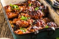 Grilled roasted and barbecue chicken legs in pan Royalty Free Stock Photo