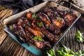 Grilled roasted and barbecue chicken legs in pan Royalty Free Stock Photo