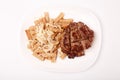 Grilled roasted Entrecote steak meat on a white plate with pasta and cheese isolated on white