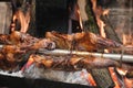 Grilled roasted mutton meat on spit at street food market Royalty Free Stock Photo