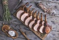 Grilled roasted rack of pork,slice meat chops on a portion wooden board Royalty Free Stock Photo