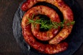 Grilled or Roasted spiral pork sausages Royalty Free Stock Photo