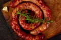 Grilled or Roasted spiral pork sausages Royalty Free Stock Photo