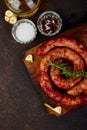 Grilled or Roasted spiral pork sausages with rosemary Royalty Free Stock Photo