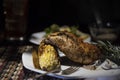 Grilled rosemary chicken dinner with corn and salad. Royalty Free Stock Photo