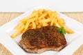 Grilled rumpsteak with fries Royalty Free Stock Photo