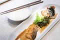 Grilled Saba fish and Salmon fish sauce with rice and chopsticks on table. Japanese food Royalty Free Stock Photo