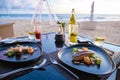 Grilled Salmon, Dinner during sunset on the beach in Phuket Thailand Royalty Free Stock Photo