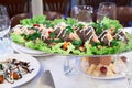 Grilled salmon in a dish on the dinner table