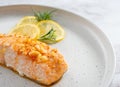 Grilled salmon fillet mediterranean dinner. Salmon roasted in olive oil lemon juice rosemary  and garlic. Portion cooked fish and Royalty Free Stock Photo