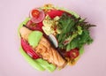 Grilled salmon fillet, slow cooked steak with wasabi cream sauce, radish, tomato and passionfruit served with potato salad on Royalty Free Stock Photo