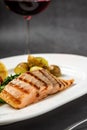 Grilled salmon fillet with vegetables mix. dark background Royalty Free Stock Photo