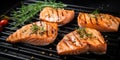 Grilled salmon fillets steaks with salt pepper and herb on grill 1