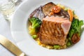 Grilled Salmon Fillets with Vegetables on White Plate