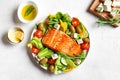 Grilled salmon fish fillet and greek salad Royalty Free Stock Photo