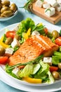 Grilled salmon fish fillet and greek salad Royalty Free Stock Photo