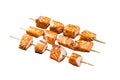 Grilled salmon kebab skewers. Isolated on white background. Top view. Royalty Free Stock Photo