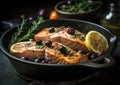 Grilled salmon with lemon, olives and fresh rosemary is a healthy and tasty dish. Royalty Free Stock Photo