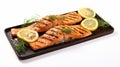 Grilled salmon with lemon on a plate isolated on white background Royalty Free Stock Photo