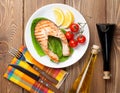 Grilled salmon, salad and condiments Royalty Free Stock Photo