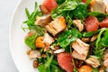 Grilled salmon salad with grapefruit, almonds and salad mix. Top view. Banner Royalty Free Stock Photo