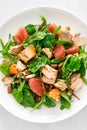 Grilled salmon salad with grapefruit, almonds and salad mix. Top view Royalty Free Stock Photo