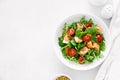Grilled salmon salad with tomato and salad mix. Top view Royalty Free Stock Photo