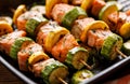 Grilled salmon skewers with zucchini and herb marinade in a grill pan