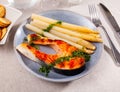 Grilled salmon steak with asparagus and pesto Royalty Free Stock Photo