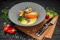 Grilled salmon steak with cheese sauce and asparagus Royalty Free Stock Photo