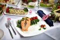 Grilled salmon steak with green beans, on decorated dining table Royalty Free Stock Photo