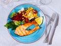 Grilled salmon steak with vegetable salad Royalty Free Stock Photo