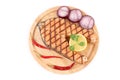 Grilled salmon steak on wooden platter. Royalty Free Stock Photo