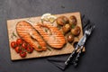 Grilled salmon steaks and potatoes