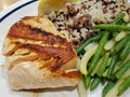 Grilled salmon with wild rice and green beans Royalty Free Stock Photo