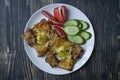 Grilled sandwich with egg, vegetables and bacon on a dark wooden background. Tasty breakfast Royalty Free Stock Photo