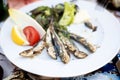 Grilled sardines.