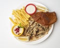 Grilled Sardines plate served with sauce on white