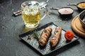 Grilled sausage and beer. Traditional Oktoberfest menu. Food recipe background. Close up