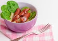 Grilled sausage - pork sausage, rigatoni and fresh spinach in a bowl