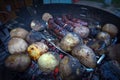 Grilled sausage and potaoes, barbecue Royalty Free Stock Photo