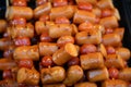 Grilled sausage preparation on sale in the market.Closeup Home-made Sausages Royalty Free Stock Photo