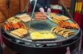 Grilled sausages assortment with french fries Royalty Free Stock Photo