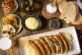 Grilled Sausages with Cabbage Salad, Mustard and Beer. Bratwurst and Sauerkraut.