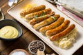 Grilled Sausages with Cabbage Salad, Mustard and Beer Royalty Free Stock Photo