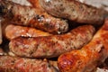 Grilled sausages. Closeup of sausage on the grill. Royalty Free Stock Photo