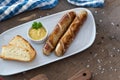 Grilled sausages. Closeup of sausage on the grill. Home-made Sausages. Bavarian sausages Royalty Free Stock Photo