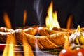 Grilled sausages on the flaming grill Royalty Free Stock Photo